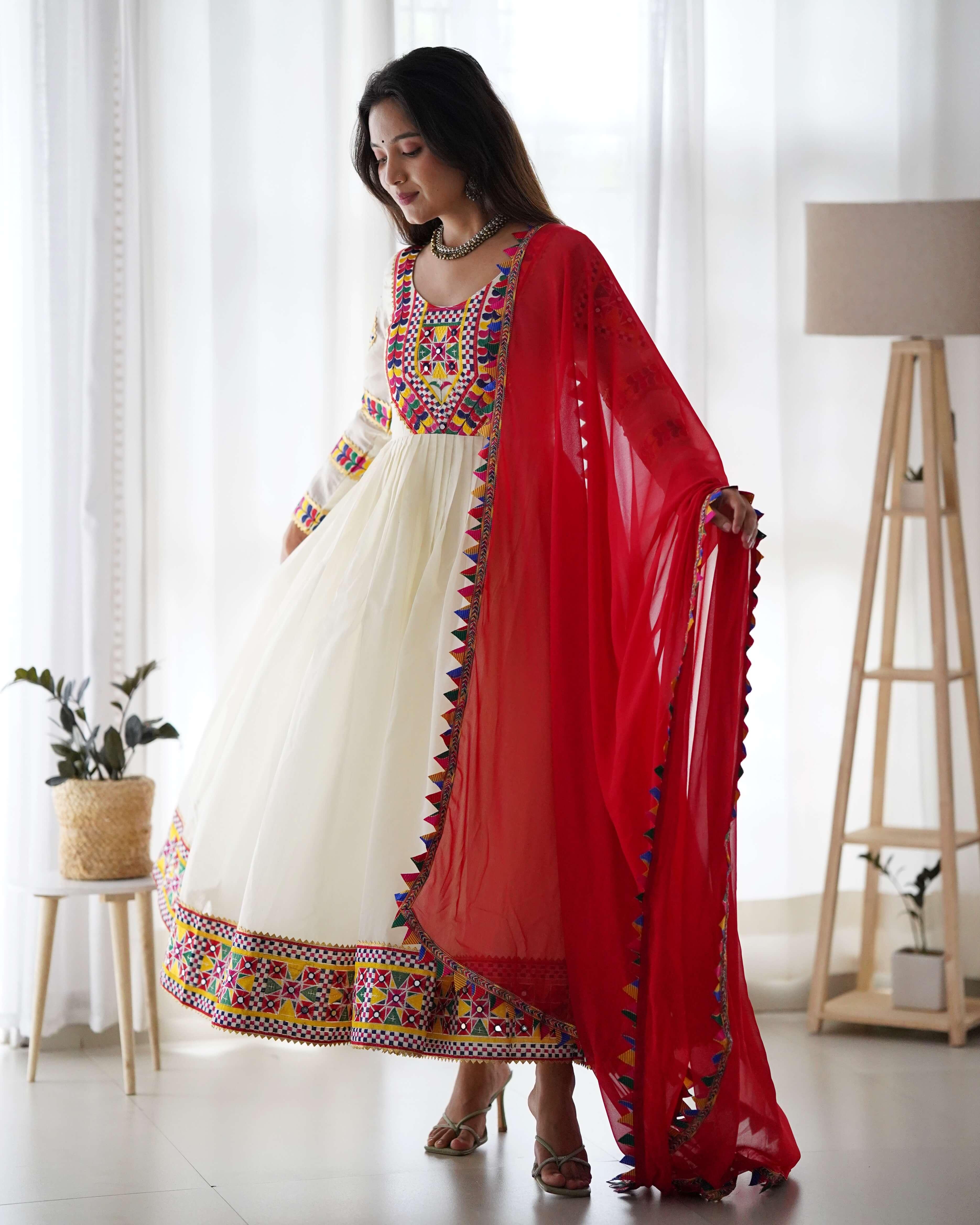 Elegant Ivory Anarkali with Vibrant Embroidered Details & Red Dupatta