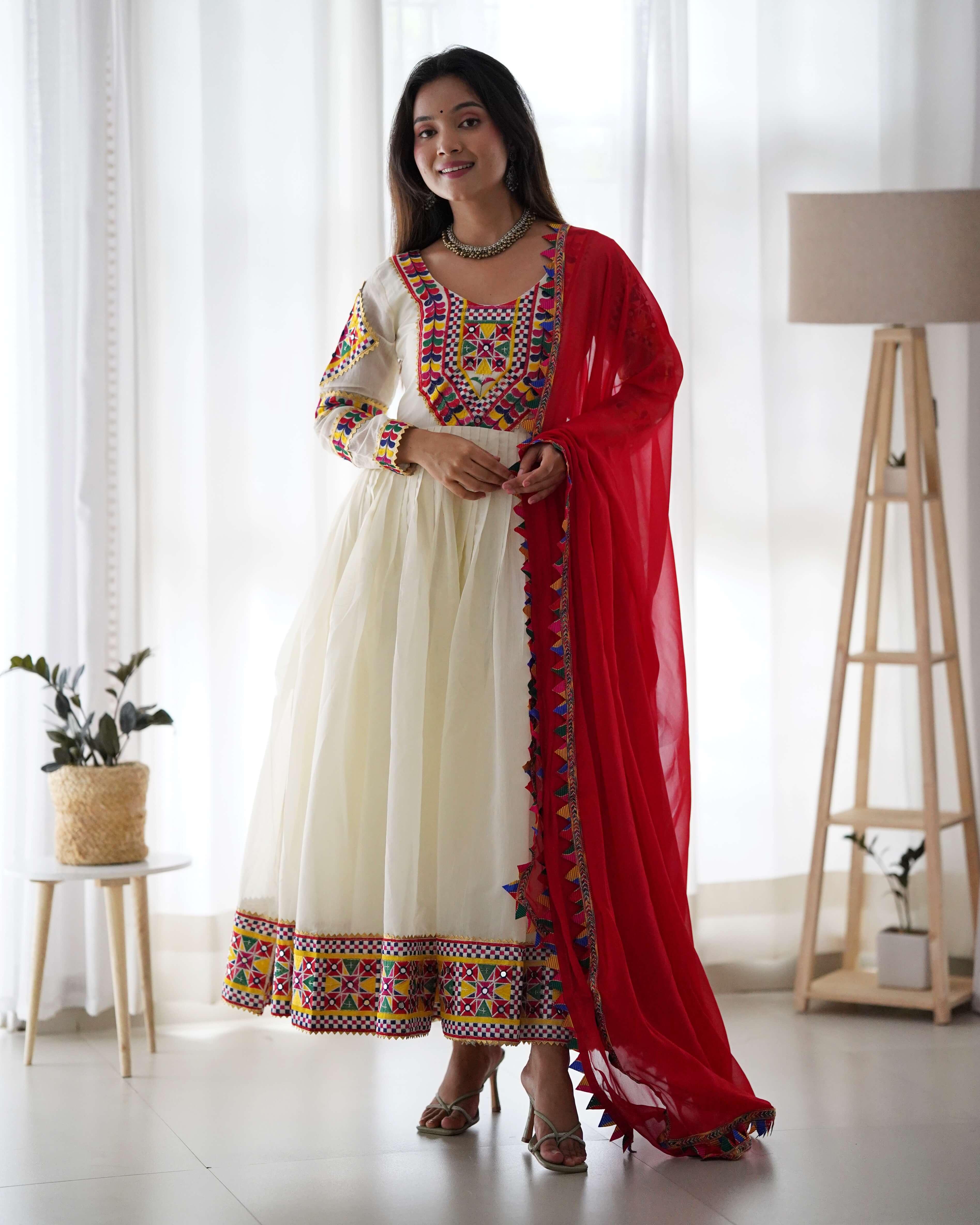 Elegant Ivory Anarkali with Vibrant Embroidered Details & Red Dupatta