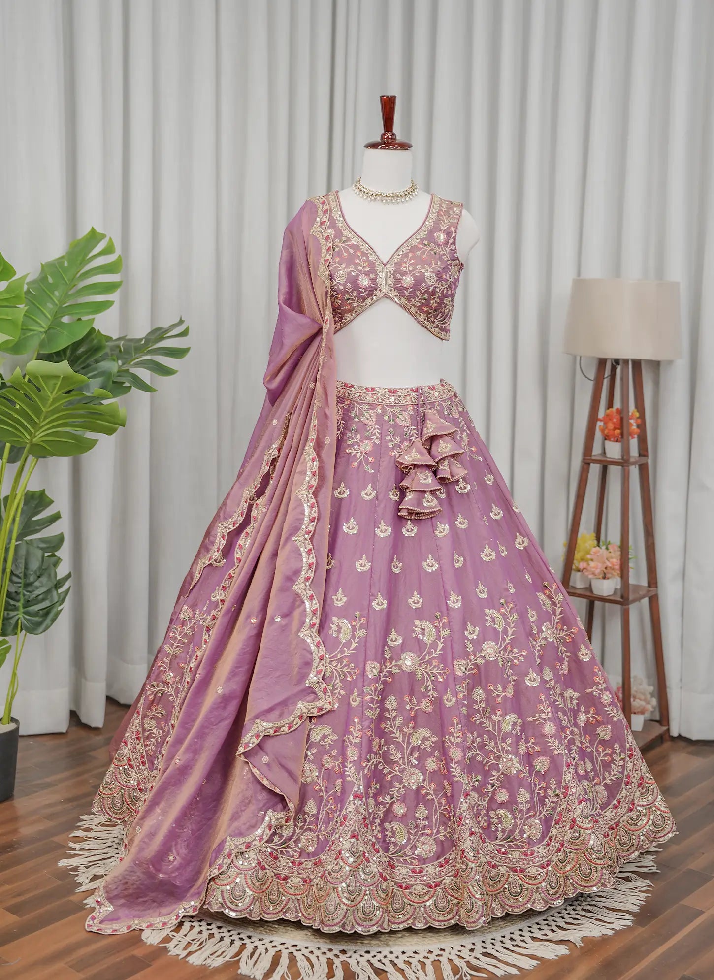 Pink embroidered wedding lehenga choli with matching dupatta front view