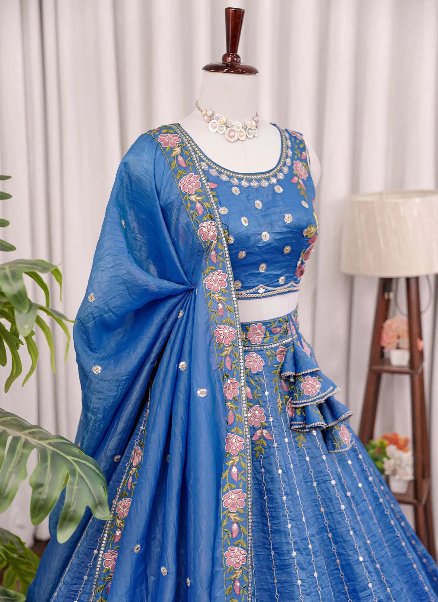 Sky blue floral embroidered lehenga choli with matching dupatta – left view