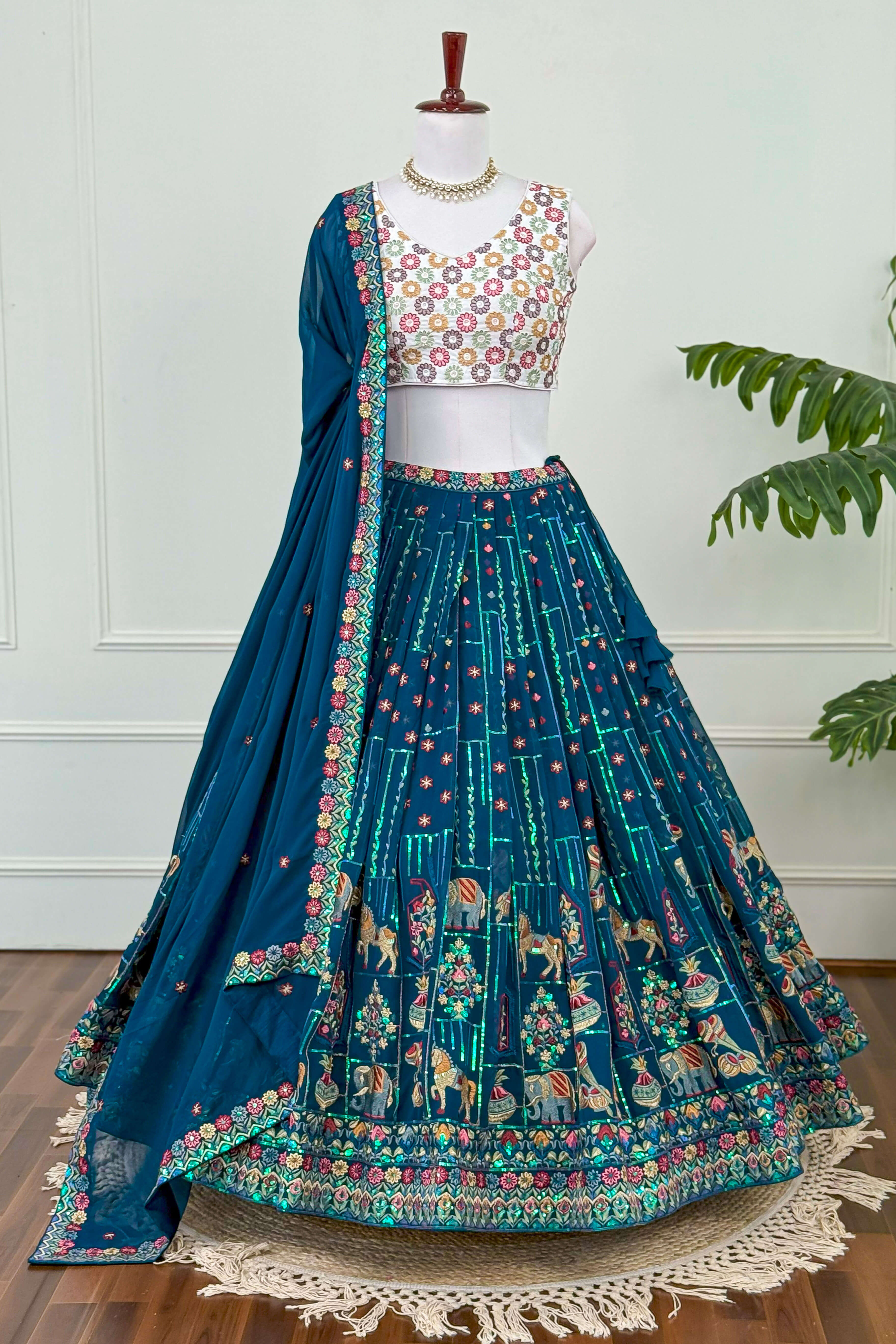 Teal Blue Embroidered Lehenga with Ivory Blouse