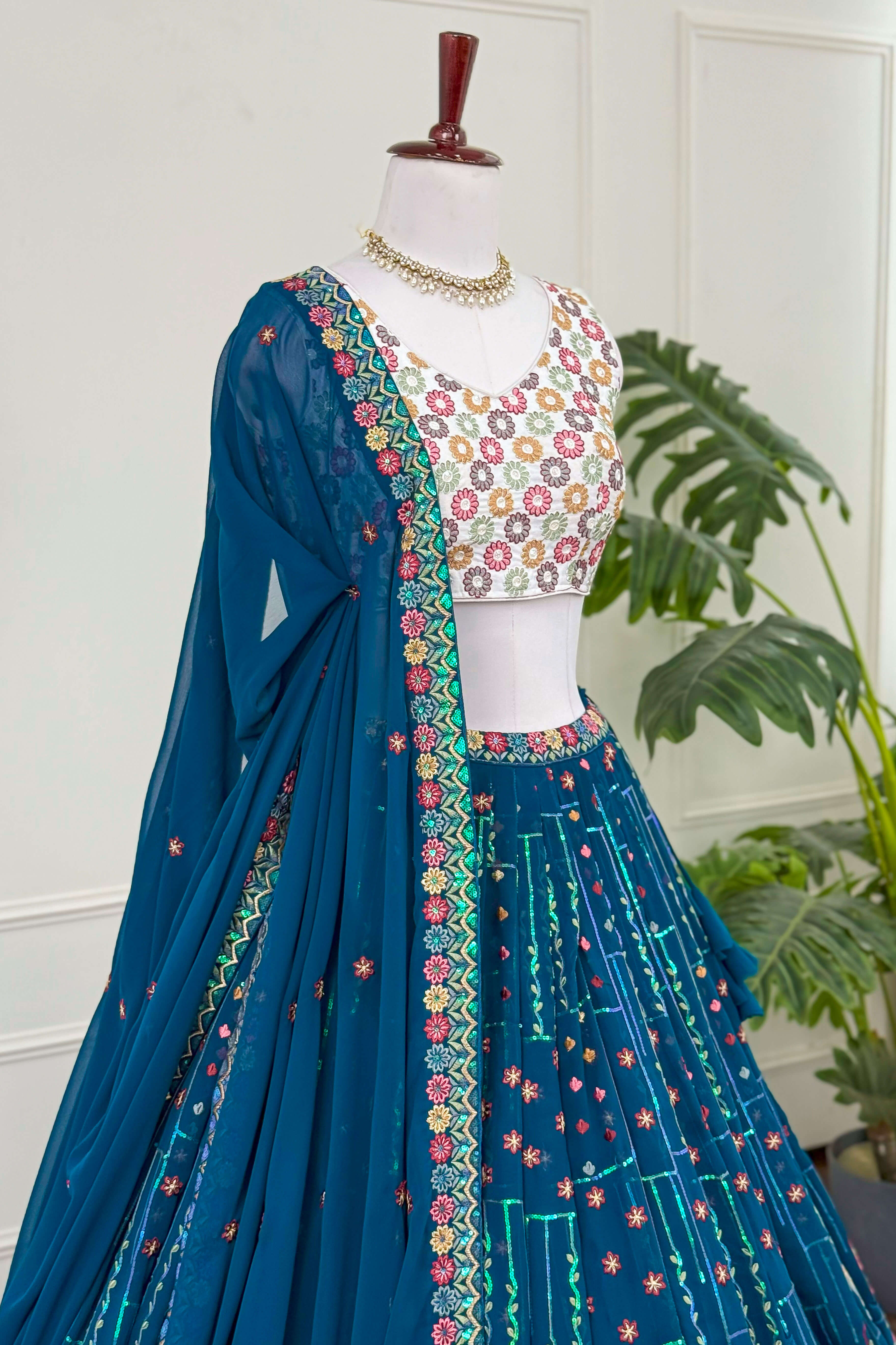 Teal Blue Embroidered Lehenga with Ivory Blouse